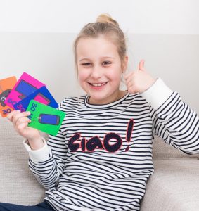 Girl giving a thumbs up with Mytimingcards time cards in her hand
